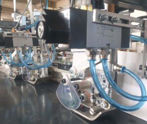 Automatic double sided tape applicator